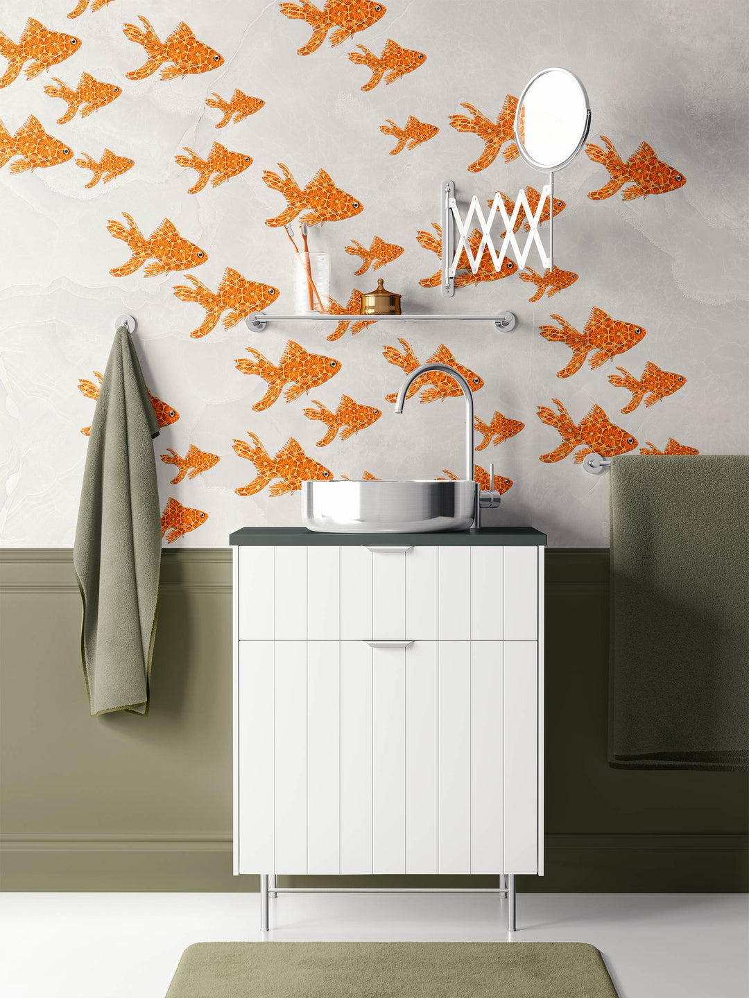 Bathroom with white vanity, green towel, and orange fish-patterned wallpaper.