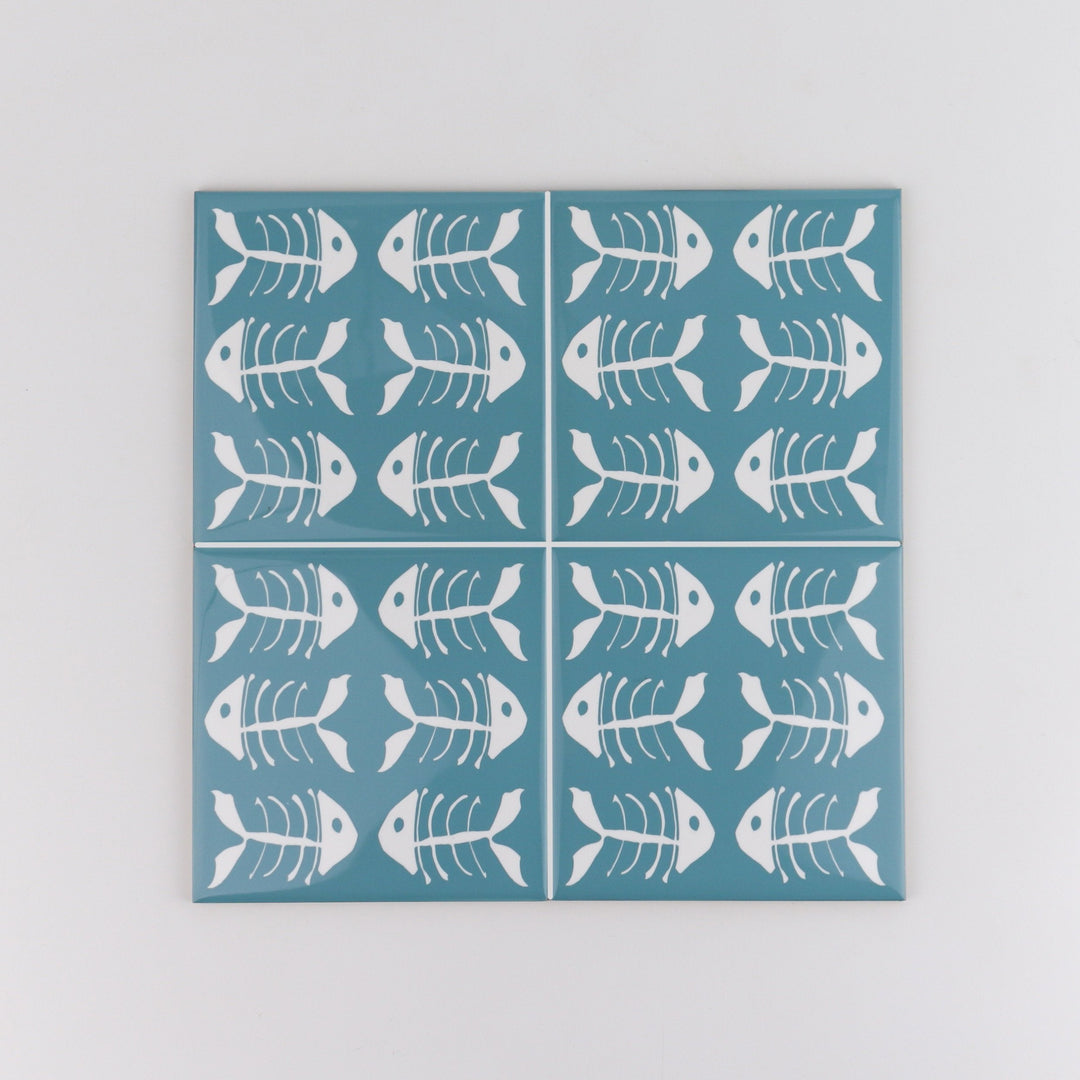 Rich blue kitchen tiles, funky bone fish design