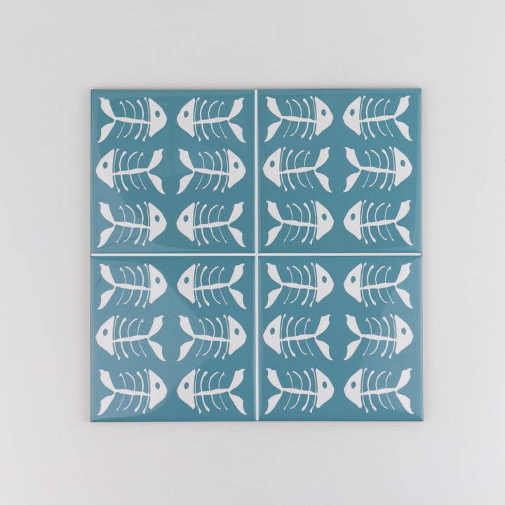 Rich blue kitchen tiles, funky bone fish design