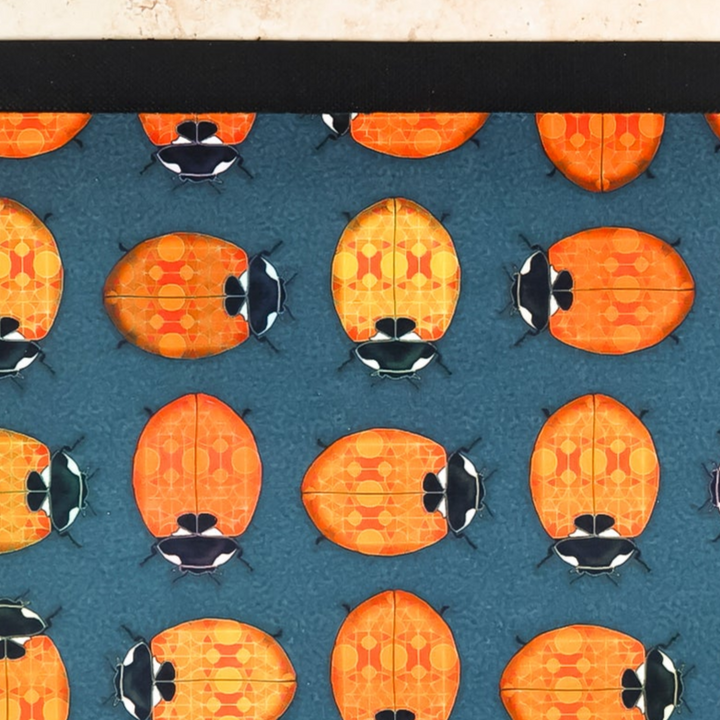 Lanternbugs Geometric Pet Food Mat - Red Orange &amp; Steel Grey