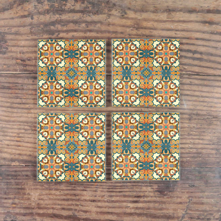 Four geometric patterned coasters
 on a wooden surface