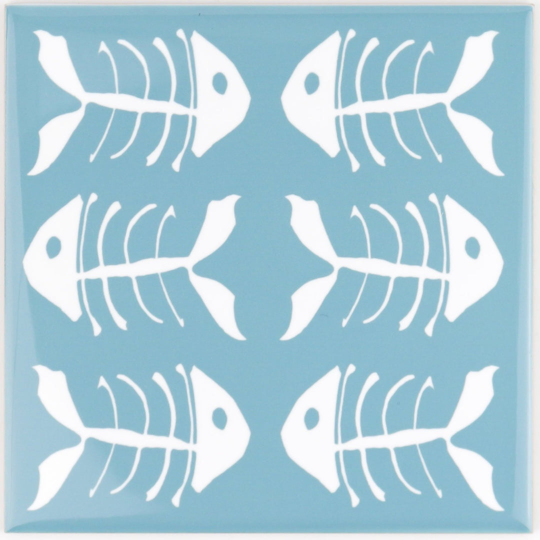 Rich blue kitchen tiles, funky bone fish design