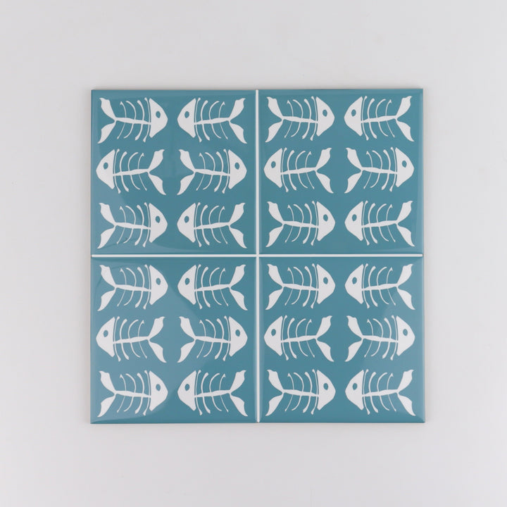 Rich blue kitchen tiles, funky bone fish design