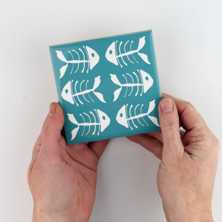 Rich blue kitchen tiles, funky bone fish design