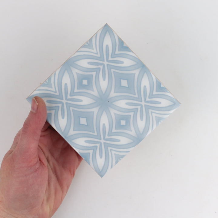 Pale blue and grey hand printed ceramic tiles